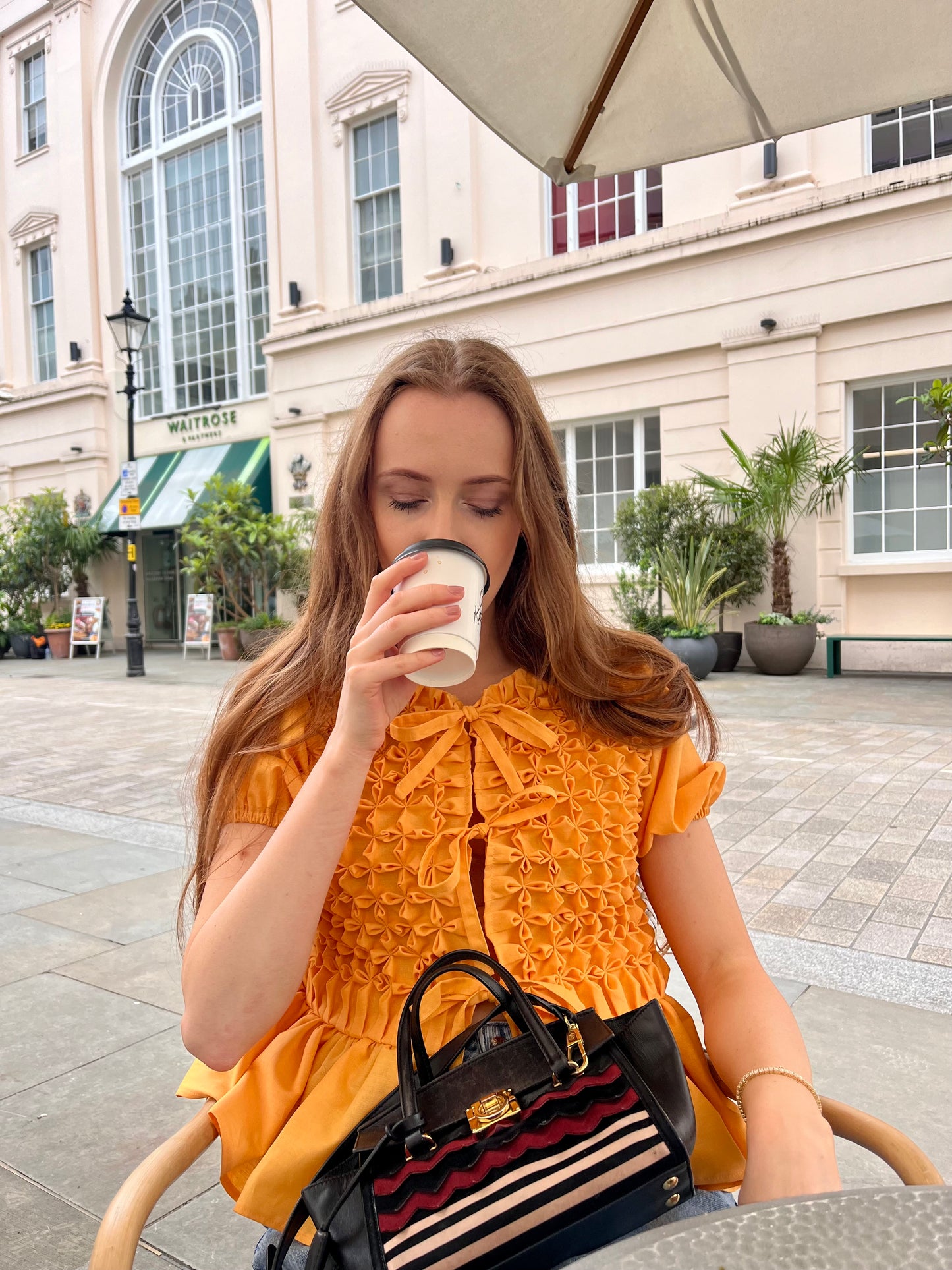 Floral smocked blouse