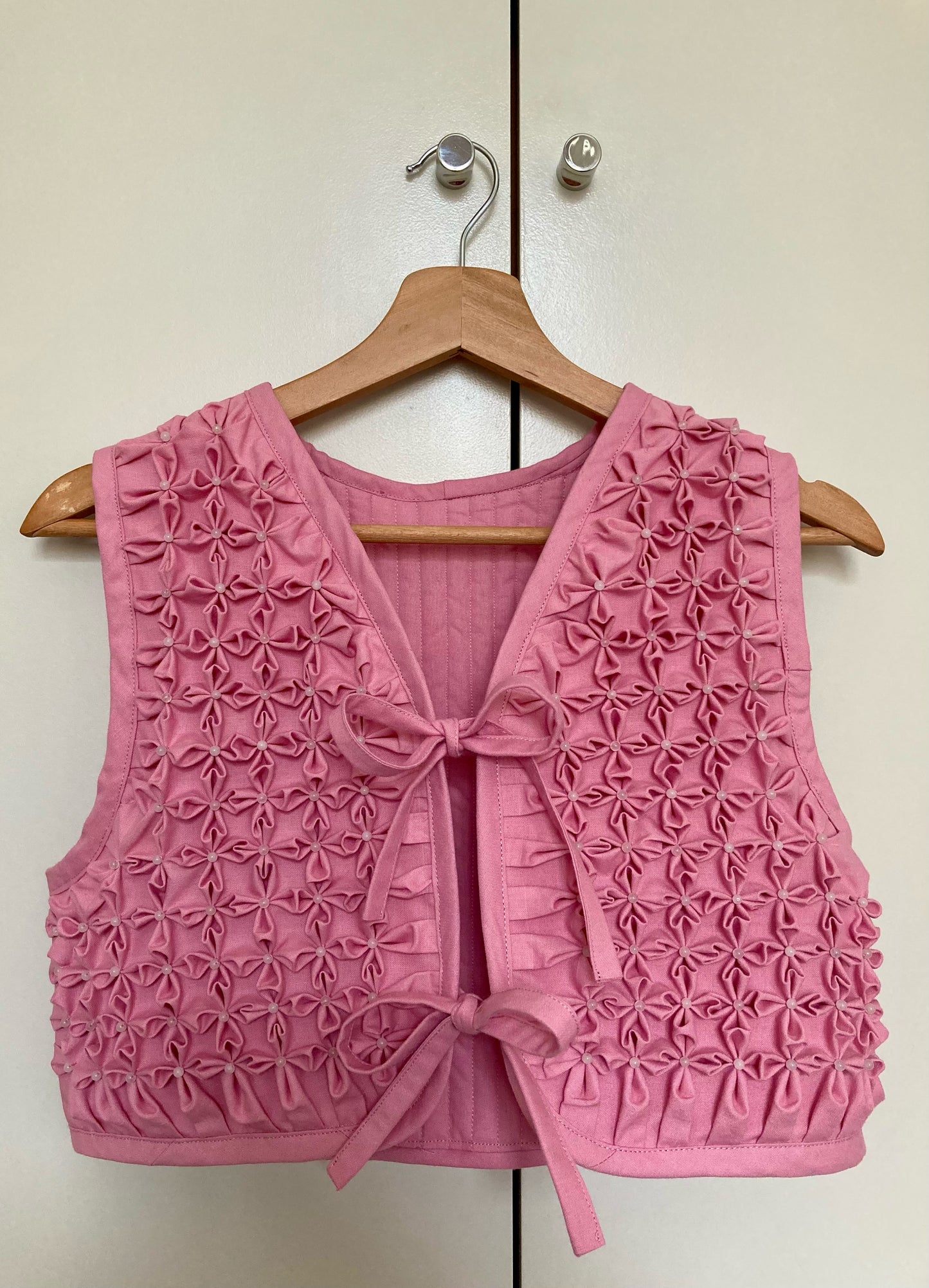 Floral smocked vest - rose quartz